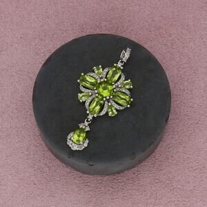 sterling silver green peridot & white topaz pendant